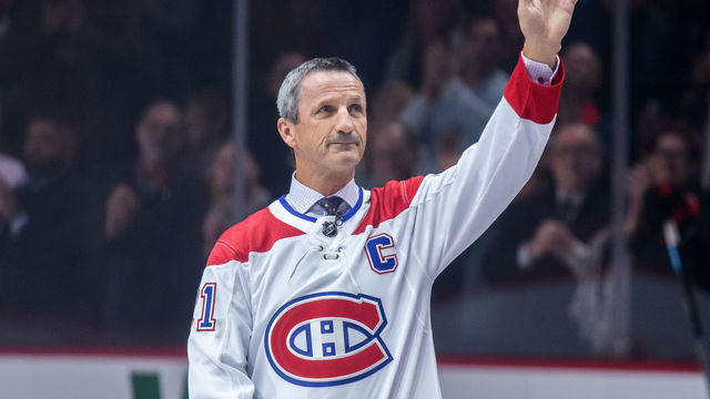 MONTREAL, QC - NOVEMBER 20: Guy Carbonneau salutes the crowd following his induction into the NHL Hall of Fame prior to the first period of the NHL game between the Ottawa Senators and the Montreal Canadiens on November 20, 2019, at the Bell Centre in Montreal, QC