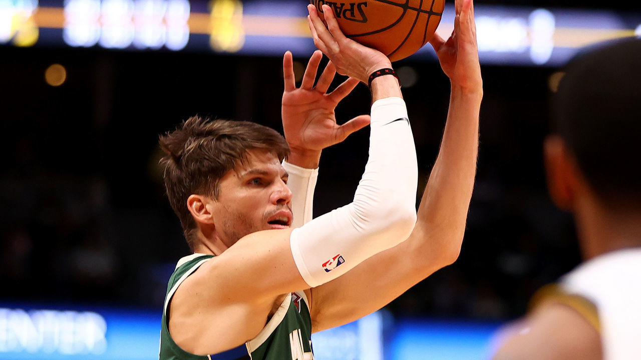 DENVER, CO - MARCH 09: Kyle Korver #26 of the Milwaukee Bucks shoots against Jamal Murray #27 of the Denver Nuggets at Pepsi Center on March 9, 2020 in Denver, Colorado. NOTE TO USER: User expressly acknowledges and agrees that, by downloading and/or using this photograph, user is consenting to the terms and conditions of the Getty Images License Agreement