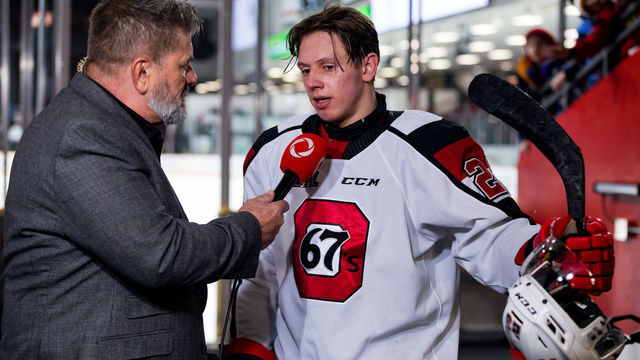 OTTAWA, ON - DECEMBER 01: Ottawa 67's Center Marco Rossi (23) is interviewed by Rogers TV Kurt Stoodley after Ontario Hockey League action between the North Bay Battalion and Ottawa 67's on December 1, 2019, at TD Place Arena in Ottawa, ON, Canada.