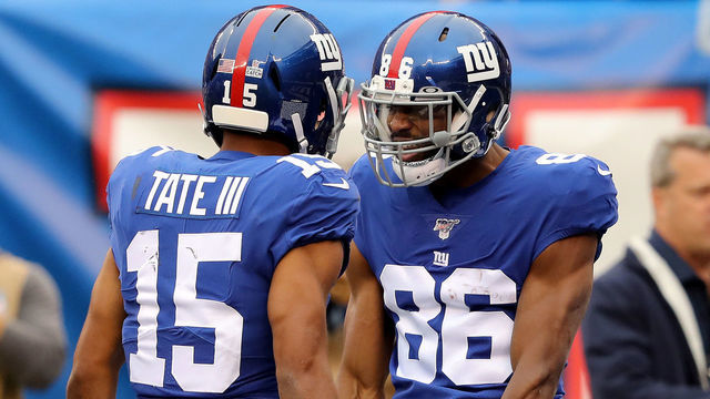 EAST RUTHERFORD, NEW JERSEY - OCTOBER 06: Darius Slayton #86 of the New York Giants celebrates with Golden Tate #15 after scoring a 35 yard touchdown pass thrown by Daniel Jones #8 against the Minnesota Vikings during the second quarter in the game at MetLife Stadium on October 06, 2019 in East Rutherford, New Jersey.