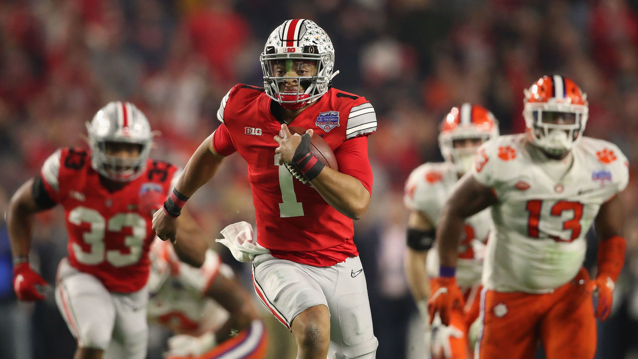 GLENDALE, ARIZONA - DECEMBER 28: Quarterback Justin Fields #1 of the Ohio State Buckeyes scrambles with the football during the PlayStation Fiesta Bowl against the Clemson Tigers at State Farm Stadium on December 28, 2019 in Glendale, Arizona. The Tigers defeated the Buckeyes 29-23.