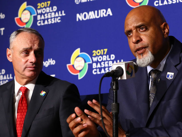 LOS ANGELES CA - MARCH 22 Major League Baseball Commissioner Robert D Manfred Jr and Major League Baseball Players Association Executive Director Tony Clark speak during a press conference before Game 3 of the Championship Round of the 2017 World Baseball Classic between Team USA and Team Puerto Rico on Wednesday March 22 2017 at Dodger Stadium in Los Angeles California