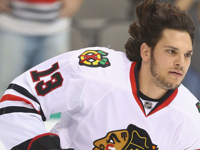 DALLAS, TX - OCTOBER 09: Daniel Carcillo #13 of the Chicago Blackhawks at American Airlines Center on October 9, 2014 in Dallas, Texas.