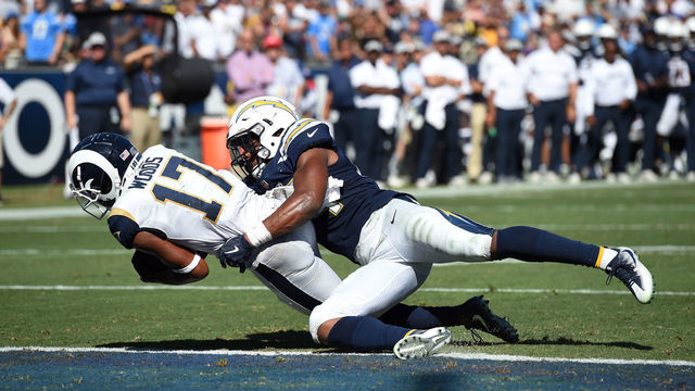 LOS ANGELES, CA - SEPTEMBER 23: Los Angeles Rams Wide Receiver Robert Woods (17) falls into the endzone for a touchdown during an NFL game between the Los Angeles Chargers and the Los Angeles Rams on September 23, 2018, at the Los Angeles Memorial Coliseum in Los Angeles, CA.