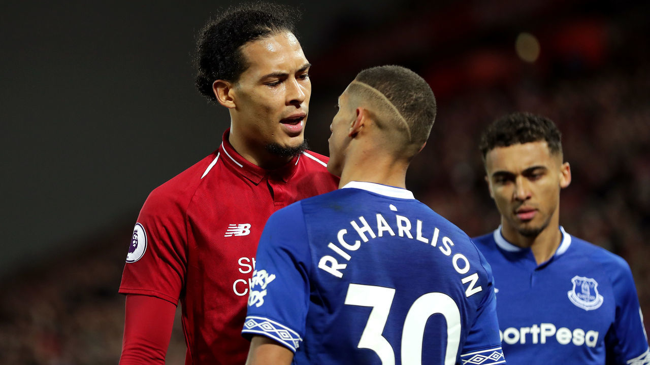 LIVERPOOL, ENGLAND - DECEMBER 02: Virgil van Dijk of Liverpool and Richarlison of Everton react during the Premier League match between Liverpool FC and Everton FC at Anfield on December 2, 2018 in Liverpool, United Kingdom.
