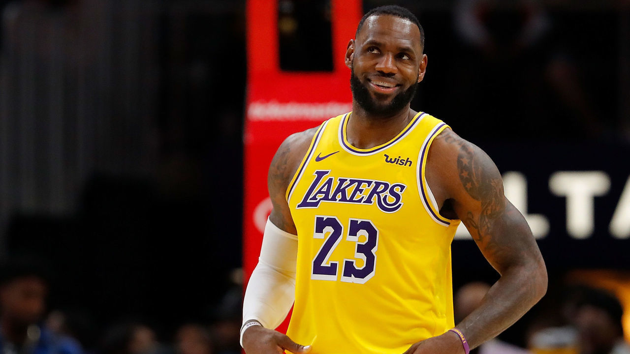 ATLANTA, GEORGIA - DECEMBER 15: LeBron James #23 of the Los Angeles Lakers enjoys a laugh during the first half against the Atlanta Hawks at State Farm Arena on December 15, 2019 in Atlanta, Georgia. NOTE TO USER: User expressly acknowledges and agrees that, by downloading and/or using this photograph, user is consenting to the terms and conditions of the Getty Images License Agreement.