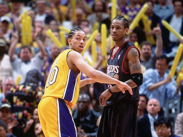 LOS ANGELES - JUNE 6: Tyronn Lue #10 of the Los Angeles Lakers defends Allen Iverson #3 of the Philadelphia 76ers during game one of the 2001 NBA Finals played June 6, 2001 at the Staples Center in Los Angeles, California. NOTE TO USER: User expressly acknowledges that, by downloading and or using this photograph, User is consenting to the terms and conditions of the Getty Images License agreement. Mandatory Copyright Notice: Copyright 2001 NBAE