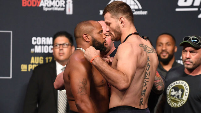 ANAHEIM, CALIFORNIA - AUGUST 16: (L-R) Daniel Cormier and Stipe Miocic face off during the UFC 241 weigh-in at the Anaheim Convention Center on August 16, 2019 in Las Vegas, Nevada.