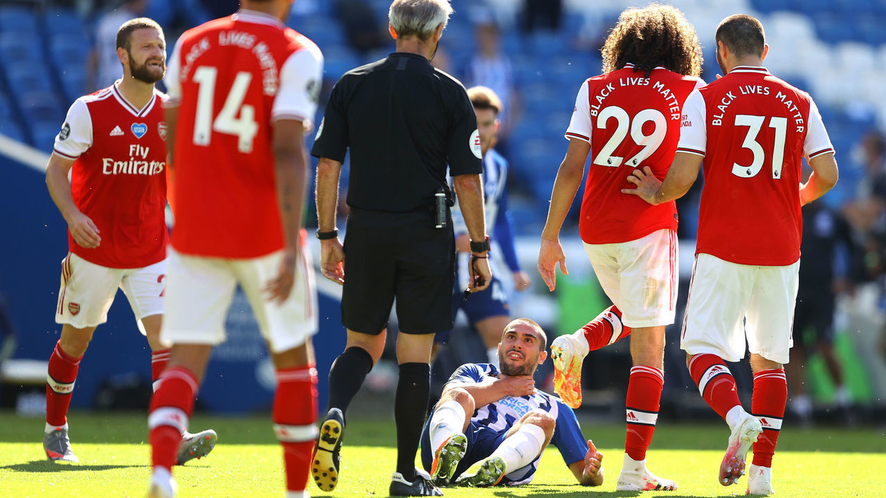 BRIGHTON, ENGLAND - JUNE 20: Matteo Guendouzi of Arsenal confronts Neal Maupay of Brighton and Hove Albion during the Premier League match between Brighton & Hove Albion and Arsenal FC at American Express Community Stadium on June 20, 2020 in Brighton, England. Football Stadiums around Europe remain empty due to the Coronavirus Pandemic as Government social distancing laws prohibit fans inside venues resulting in all fixtures being played behind closed doors.