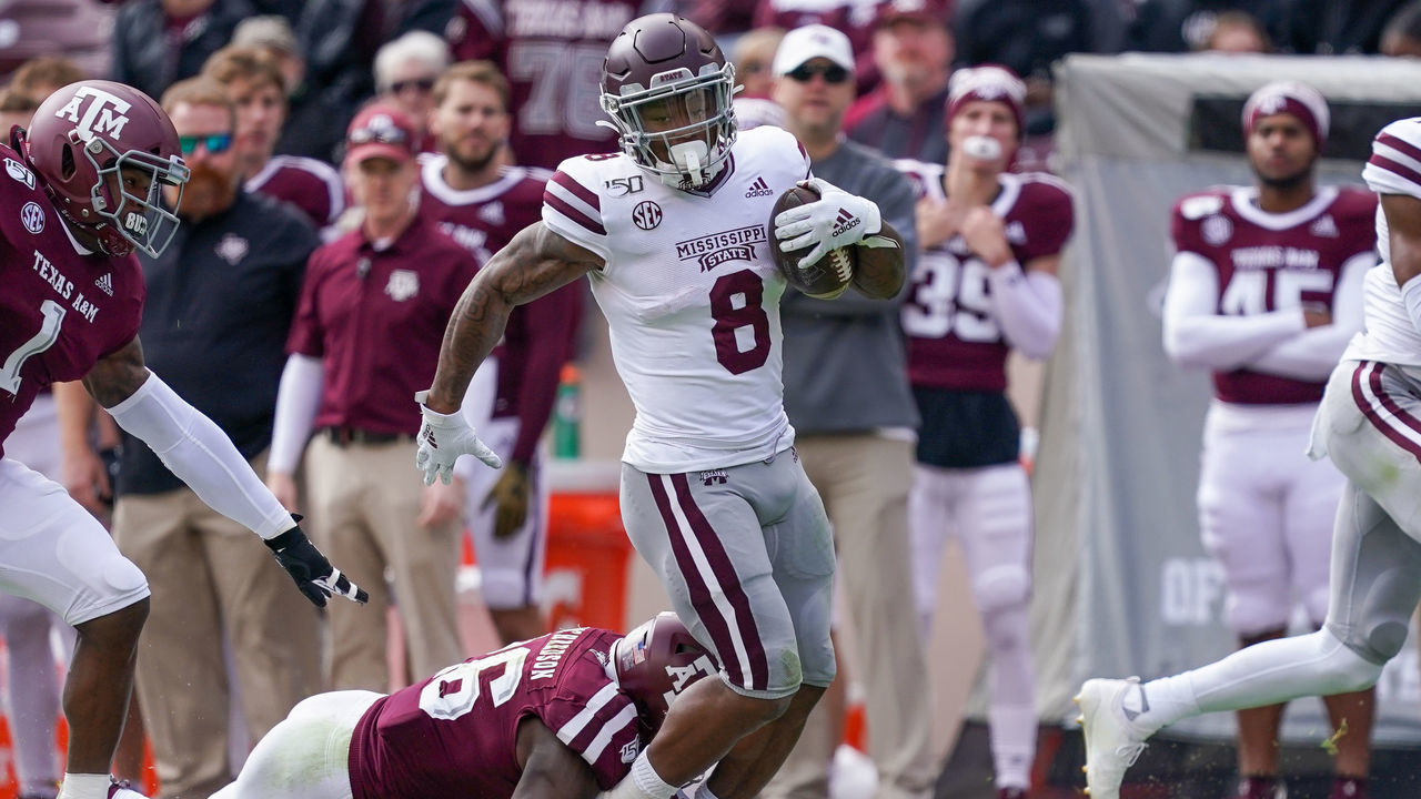 COLLEGE STATION, TX - OCTOBER 26: Texas A&M Aggies defensive back Demani Richardson (26) trips up Mississippi State Bulldogs running back Kylin Hill (8) during the college football game between the Mississippi State Bulldogs and the Texas A&M Aggies on October 26, 2019 at Kyle Field in College Station, TX.