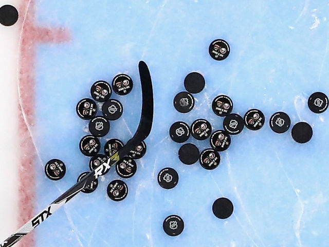 UNIONDALE, NEW YORK - OCTOBER 12: Pucks sit on the ice during warm-ups prior to the game between the Florida Panthers and the New York Islanders at NYCB Live's Nassau Coliseum on October 12, 2019 in Uniondale, New York.