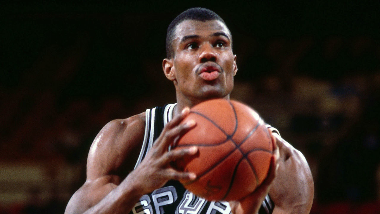 NEW YORK - CIRCA 1989: David Robinson #50 of the San Antonio Spurs shoots against the New York Knicks circa 1989 at Madison Square Garden in New York City . NOTE TO USER: User expressly acknowledges and agrees that, by downloading and/or using this photograph, user is consenting to the terms and conditions of the Getty Images License Agreement. Mandatory Copyright Notice: Copyright 1989 NBAE