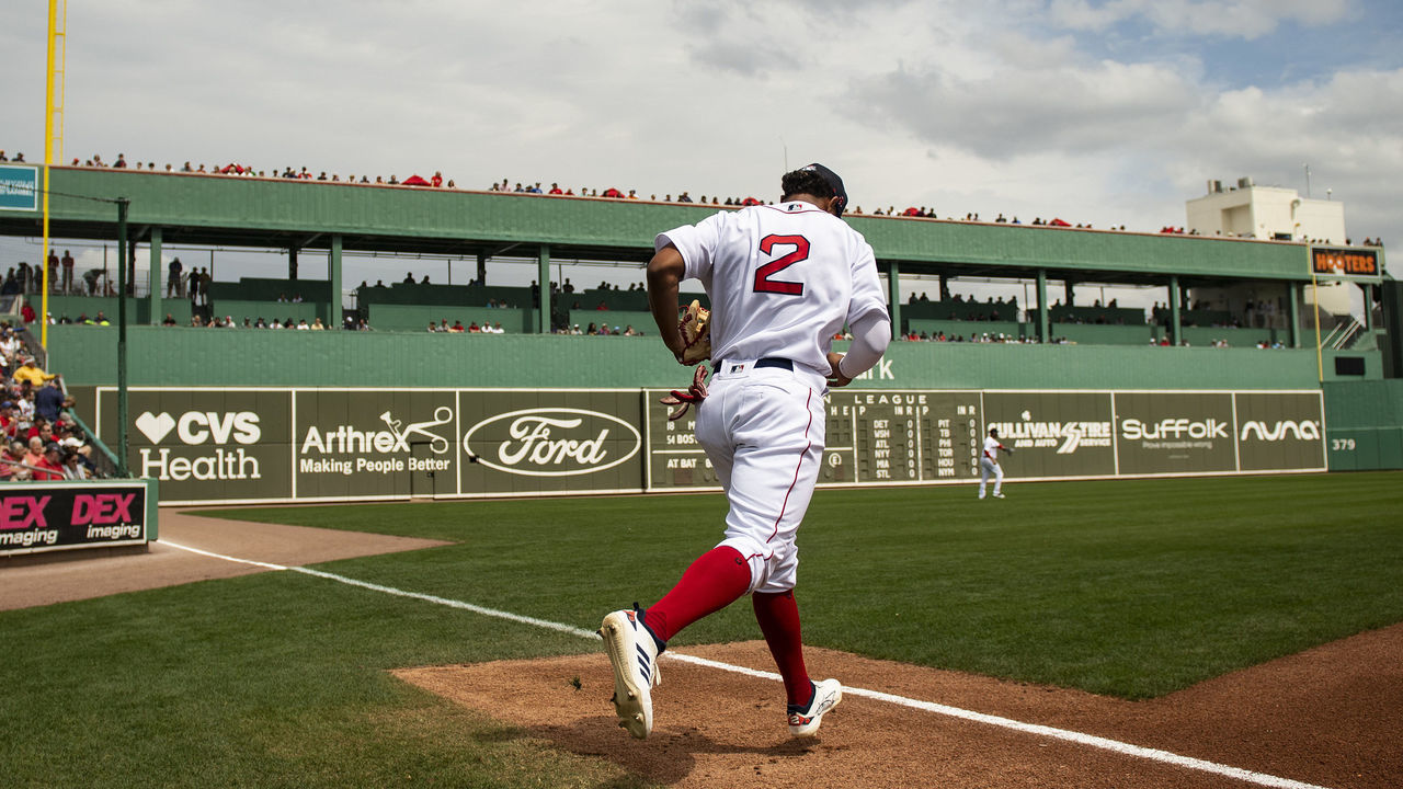 FT. MYERS, FL - MARCH 8: Xander Bogaerts #2 of the Boston Red Sox runs onto the field before a Grapefruit League game against the Minnesota Twins on March 8, 2020 at jetBlue Park at Fenway South in Fort Myers, Florida.