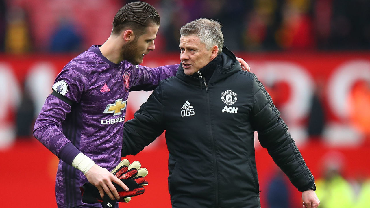 MANCHESTER, ENGLAND - FEBRUARY 23: David de Gea of Manchester United and Ole Gunnar Solskjaer the head coach / manager of Manchester United during the Premier League match between Manchester United and Watford FC at Old Trafford on February 23, 2020 in Manchester, United Kingdom.
