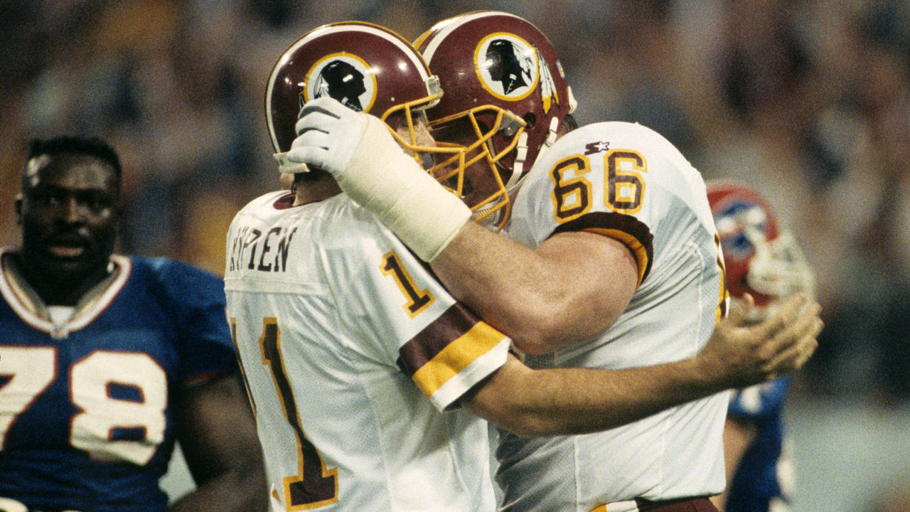 Pro Football Hall of Famer John Riggins #44 has a great muddy game