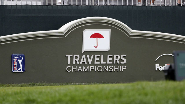 CROMWELL, CT - JUNE 20: Travelers signage at the first tee during the First Round of the Travelers Championship on June 20, 2019 at TPC River Highlands in Cromwell, Connecticut.