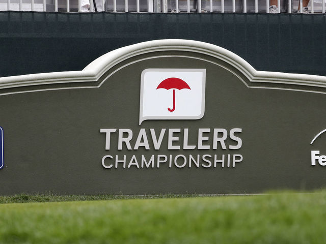 CROMWELL, CT - JUNE 20: Travelers signage at the first tee during the First Round of the Travelers Championship on June 20, 2019 at TPC River Highlands in Cromwell, Connecticut.