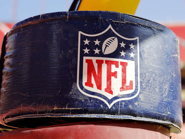 KANSAS CITY, MISSOURI - JANUARY 19: A detail view of the NATIONAL FOOTBALL LEAGUE logo on the goal post stanchion before the AFC Championship Game between the Kansas City Chiefs and the Tennessee Titans at Arrowhead Stadium on January 19, 2020 in Kansas City, Missouri.