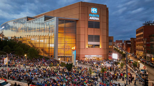 PITTSBURGH, PA - June 08: Fans gather outside to watch the game on a giant screen during the NHL Stanley Cup Finals Game 5 at PPG Paints Arena on June 8, 2017.