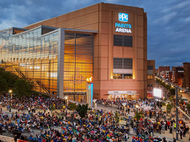 PITTSBURGH, PA - June 08: Fans gather outside to watch the game on a giant screen during the NHL Stanley Cup Finals Game 5 at PPG Paints Arena on June 8, 2017.