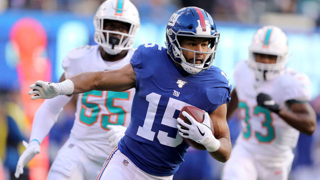 EAST RUTHERFORD, NEW JERSEY - DECEMBER 15: Golden Tate III #15 of the New York Giants runs the ball in for a touchdown in the second quarter against the Miami Dolphins at MetLife Stadium on December 15, 2019 in East Rutherford, New Jersey.