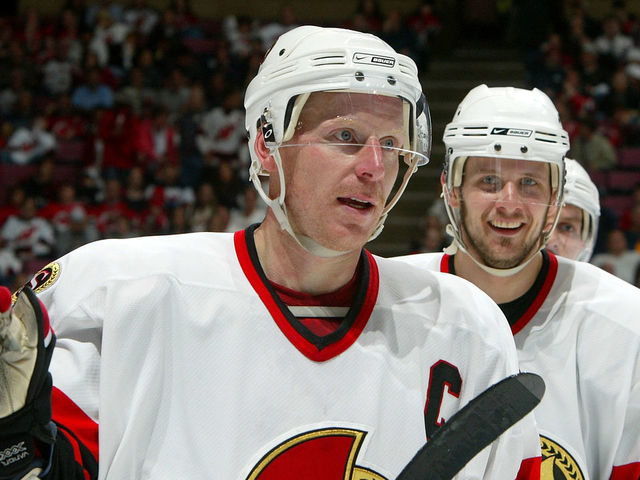 EAST RUTHERFORD, NJ - MAY 05: Daniel Alfredsson #11 of the Ottawa Senators celebrates his second-period goal with teammate Jason Spezza #19 against the New Jersey Devils during Game Five of the 2007 Eastern Conference Semifinals at the Continental Airlines Arena in the Meadowlands on May 5, 2007 in East Rutherford, New Jersey.
