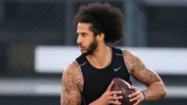 RIVERDALE, GA - NOVEMBER 16: Colin Kaepernick looks to make a pass during a private NFL workout held at Charles R Drew high school on November 16, 2019 in Riverdale, Georgia. Due to disagreements between Kaepernick and the NFL the location of the workout was abruptly changed.