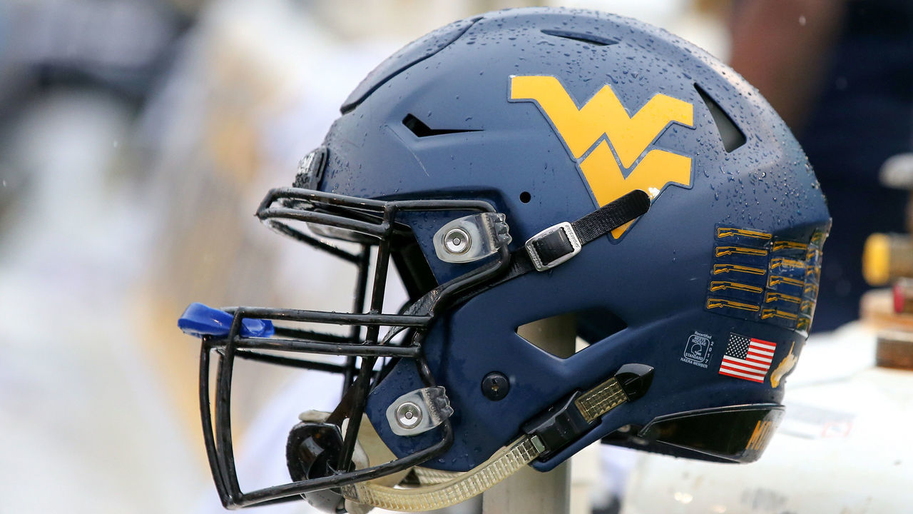 MORGANTOWN, WV - OCTOBER 28: A West Virginia Mountaineers helmet on the bench during the fourth quarter of the college football game between the Oklahoma State Cowboys and the West Virginia Mountaineers on October 28, 2017, at Mountaineer Field at Milan Puskar Stadium in Morgantown, WV. Oklahoma State defeated West Virginia 50-39.