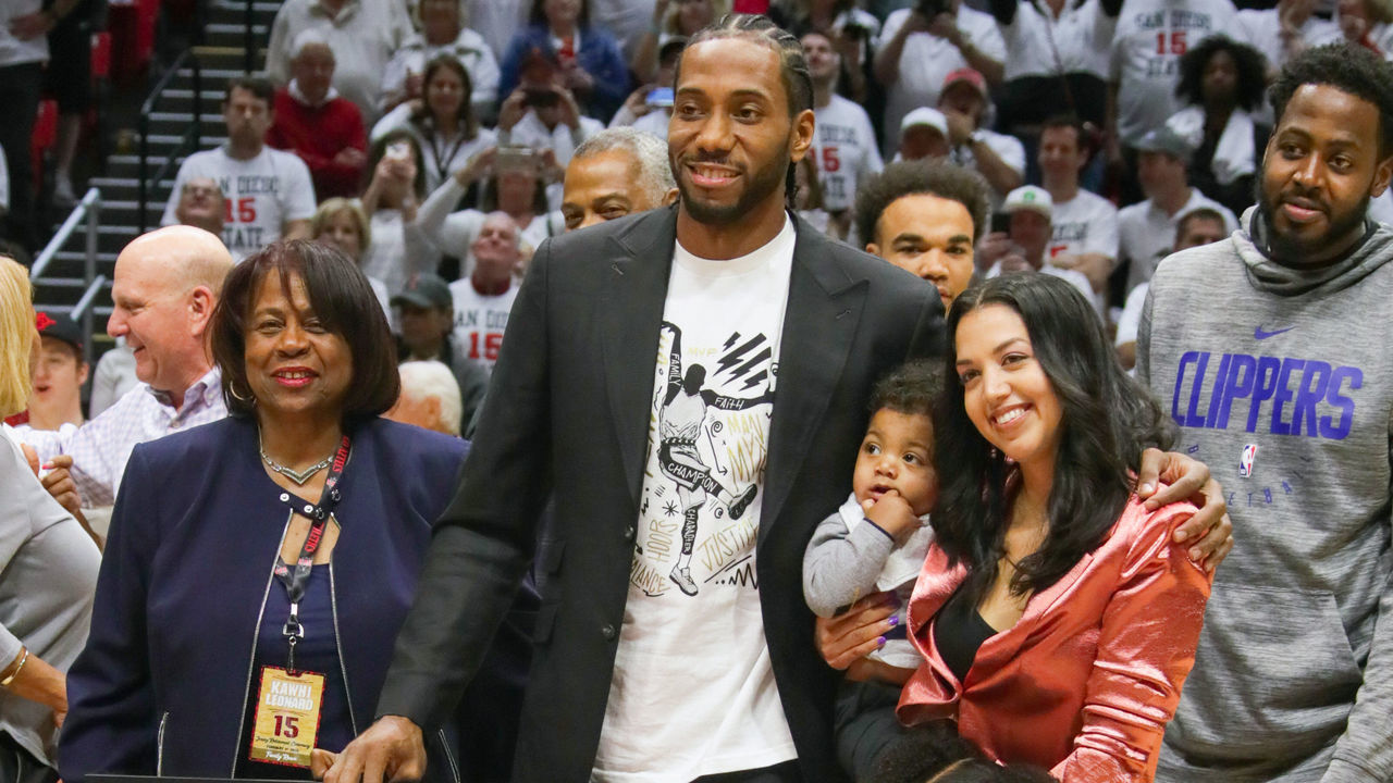 SAN DIEGO, CALIFORNIA - FEBRUARY 01: San Diego State Alumni Kawhi Leonard participates with his LA Clippers teammates and family in his jersey retirement ceremony during half time of the game against the San Diego State Aztecs and the Utah State Aggies at Viejas Arena on February 01, 2020 in San Diego, California.