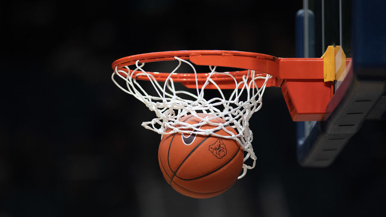 INDIANAPOLIS, IN - FEBRUARY 05: NCAA basketball with the Butler Bulldogs logo goes through the net before the men's college basketball game between the Villanova Wildcats and Butler Bulldogs on February 5, 2020, at Hinkle Fieldhouse in Indianapolis, IN.