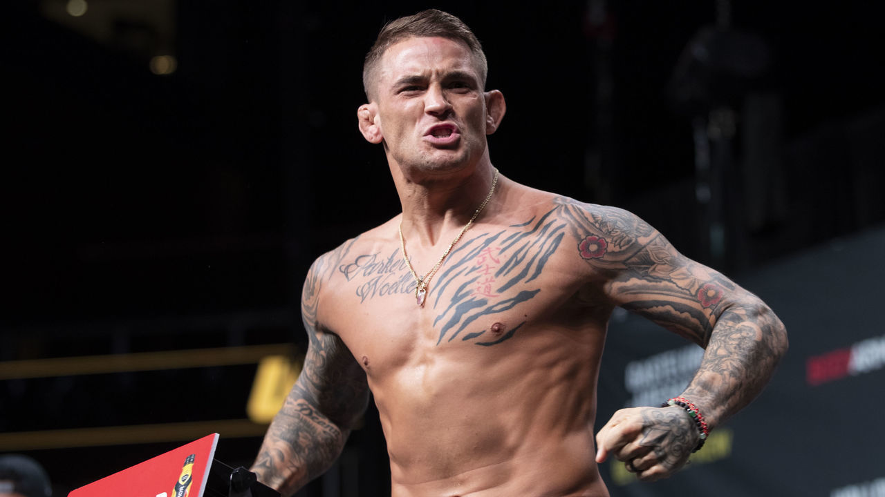 ATLANTA, GA - APRIL 12: Dustin Poirier gestures to the crowd during the UFC 236 weigh-in at State Farm Arena on April 12, 2019 in Atlanta, Georgia.