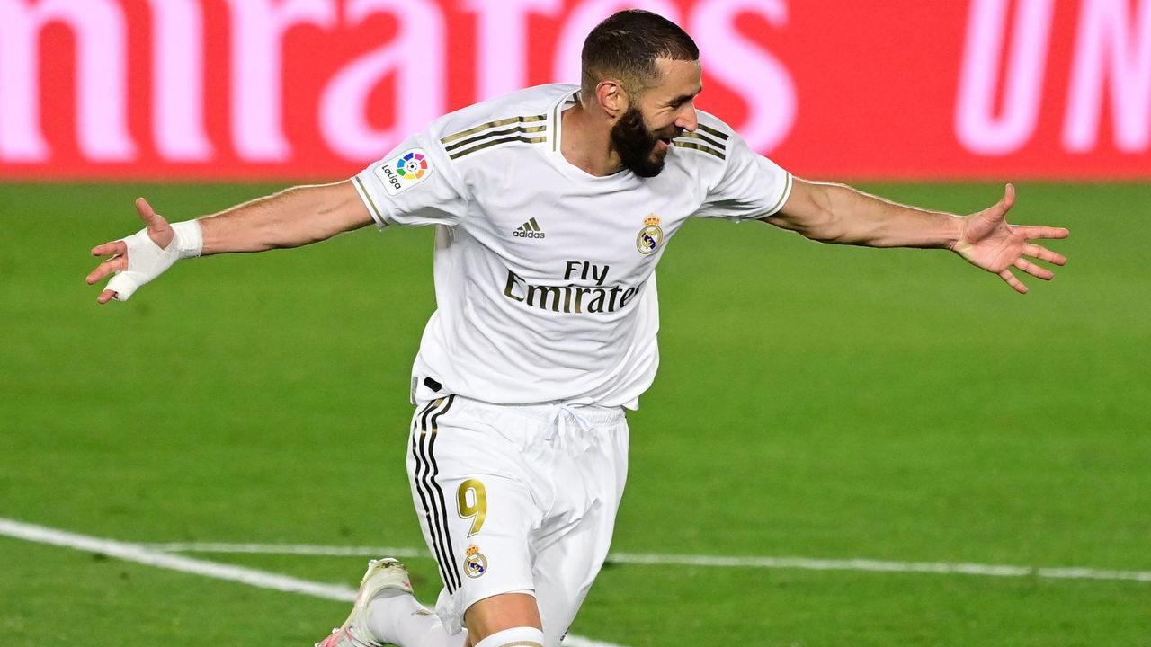 Real Madrid's French forward Karim Benzema celebrates his second goal during the Spanish league football match between Real Madrid CF and Valencia CF at the Alfredo di Stefano stadium in Valdebebas, on the outskirts of Madrid, on June 18, 2020.
