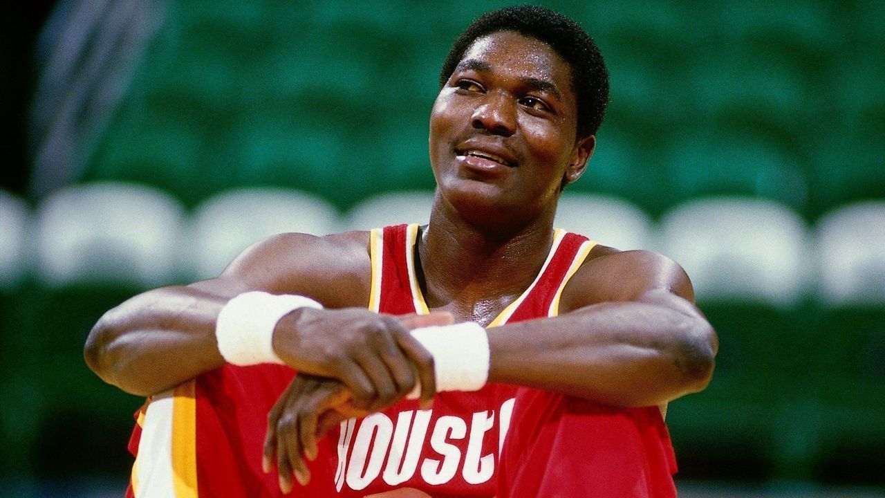 1984: Hakeem Olajuwon #34 of the Houston Rockets looks on prior to an NBA game circa 1984. NOTE TO USER: User expressly acknowledges and agrees that, by downloading and/or using this Photograph, User is consenting to the terms and conditions of the Getty Images License Agreement. Mandatory Copyright Notice: Copyright 1984 NBAE (Photo byPaul Reed Smith/NBAE via Getty Images)