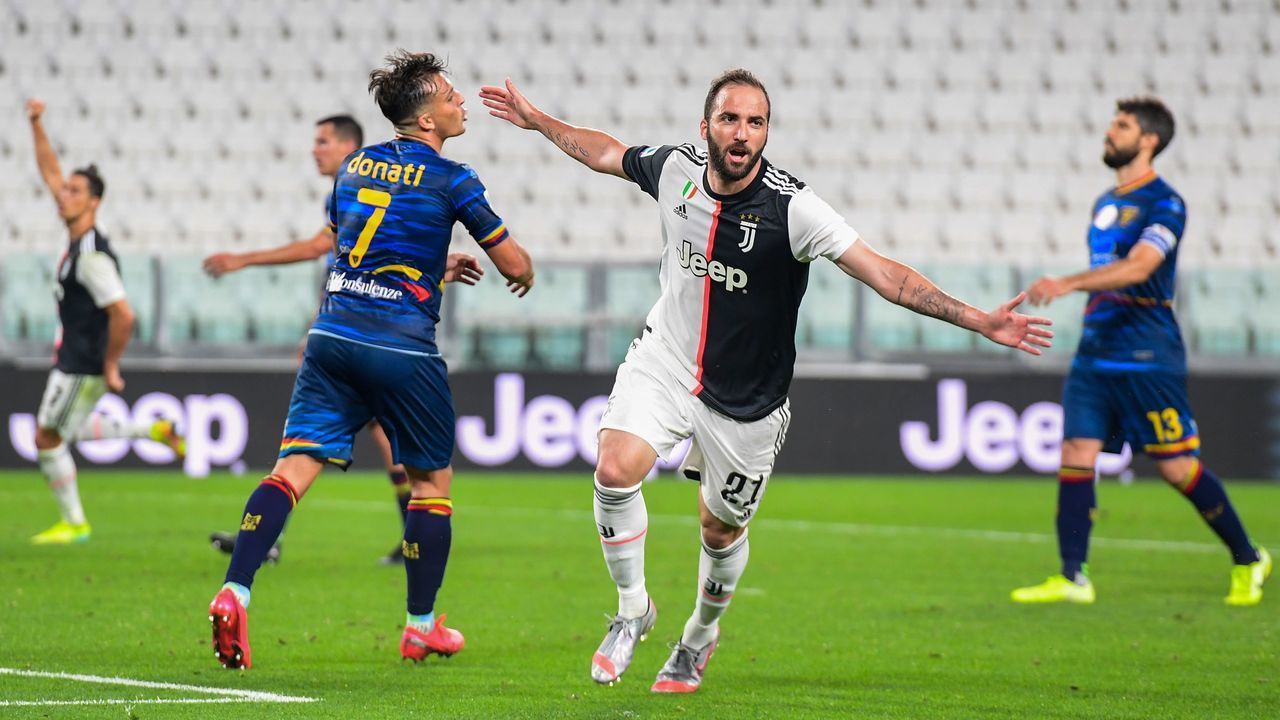 Juventus' Argentinian forward Gonzalo Higuain celebrates after scoring during the Italian Serie A football match Juventus vs Lecce played on June 26, 2020 behind closed doors at the Juventus stadium in Turin, as the country eases its lockdown aimed at curbing the spread of the COVID-19 infection, caused by the novel coronavirus.
