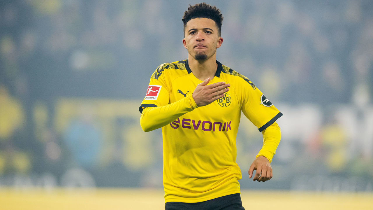 DORTMUND, GERMANY - FEBRUARY 14: Jadon Sancho of Borussia Dortmund celebrates with his team mate after scoring the 2nd goal during the Bundesliga match between Borussia Dortmund and Eintracht Frankfurt at Signal Iduna Park on February 15, 2020 in Dortmund, Germany.