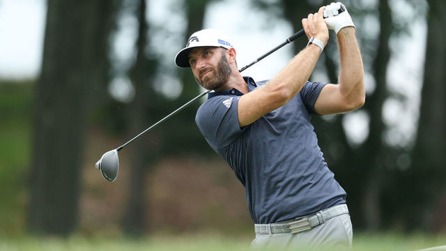 CROMWELL, CONNECTICUT - JUNE 27: Dustin Johnson of the United States plays his shot from the 18th tee during the third round of the Travelers Championship at TPC River Highlands on June 27, 2020 in Cromwell, Connecticut.