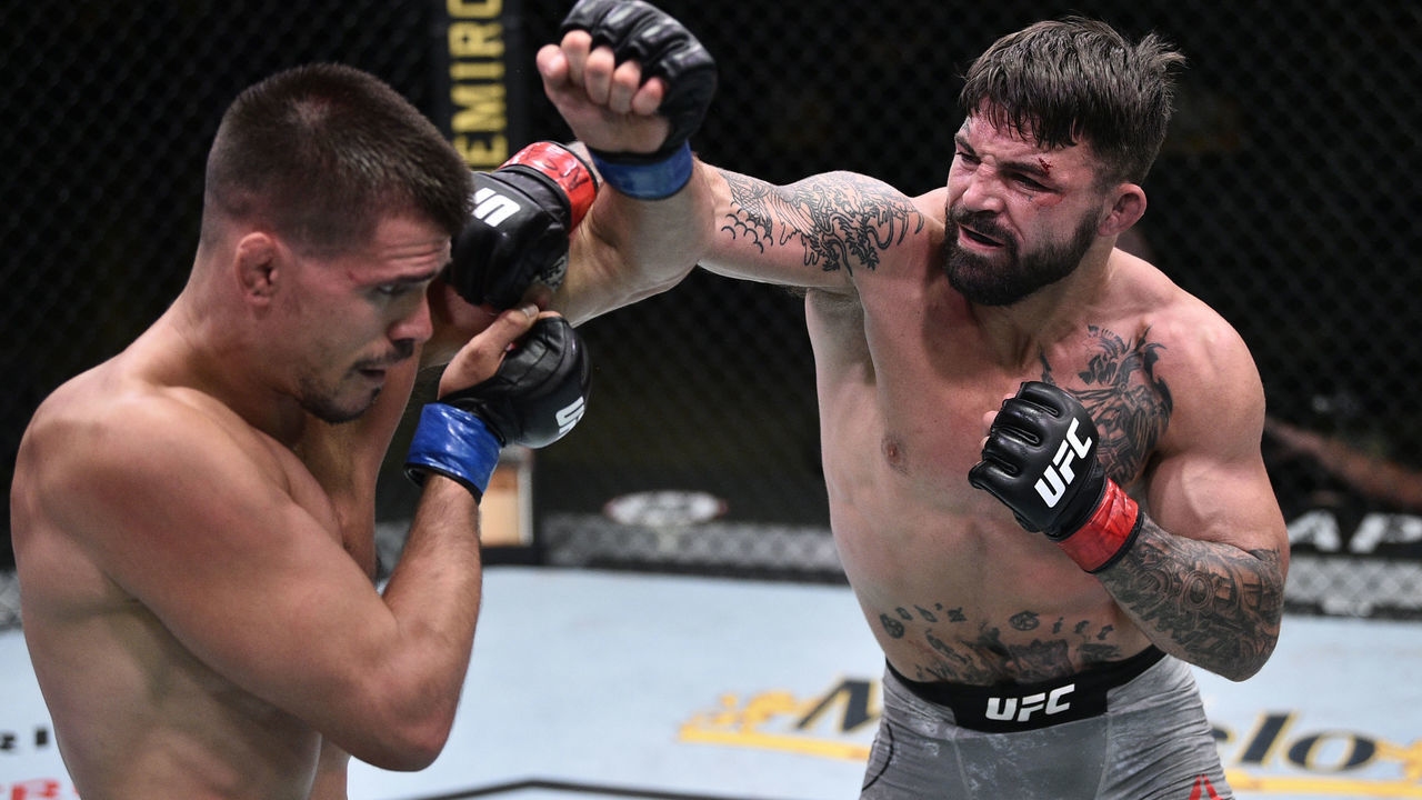 LAS VEGAS, NEVADA - JUNE 27: (R-L) Mike Perry punches Mickey Gall in their welterweight fight during the UFC Fight Night event at UFC APEX on June 27, 2020 in Las Vegas, Nevada.