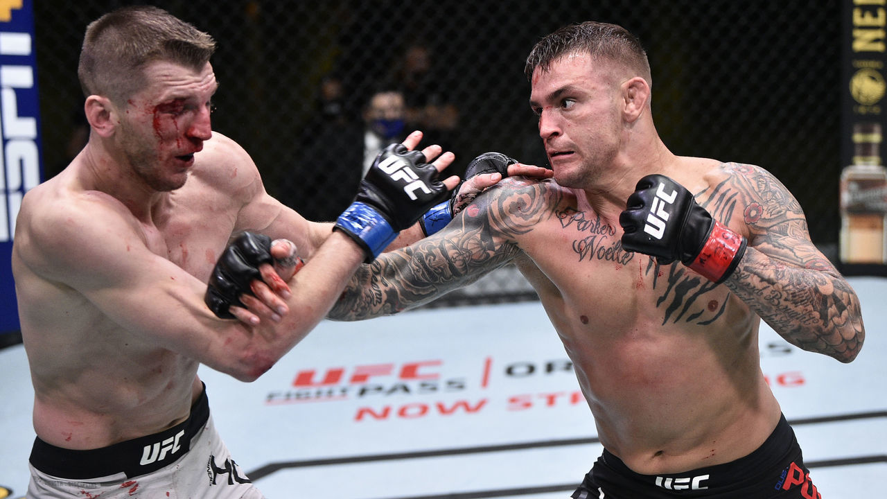 LAS VEGAS, NEVADA - JUNE 27: (R-L) Dustin Poirier punches Dan Hooker of New Zealand in their lightweight fight during the UFC Fight Night event at UFC APEX on June 27, 2020 in Las Vegas, Nevada.