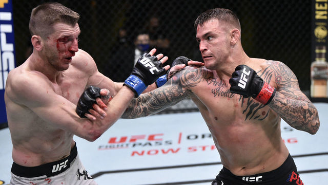LAS VEGAS, NEVADA - JUNE 27: (R-L) Dustin Poirier punches Dan Hooker of New Zealand in their lightweight fight during the UFC Fight Night event at UFC APEX on June 27, 2020 in Las Vegas, Nevada.