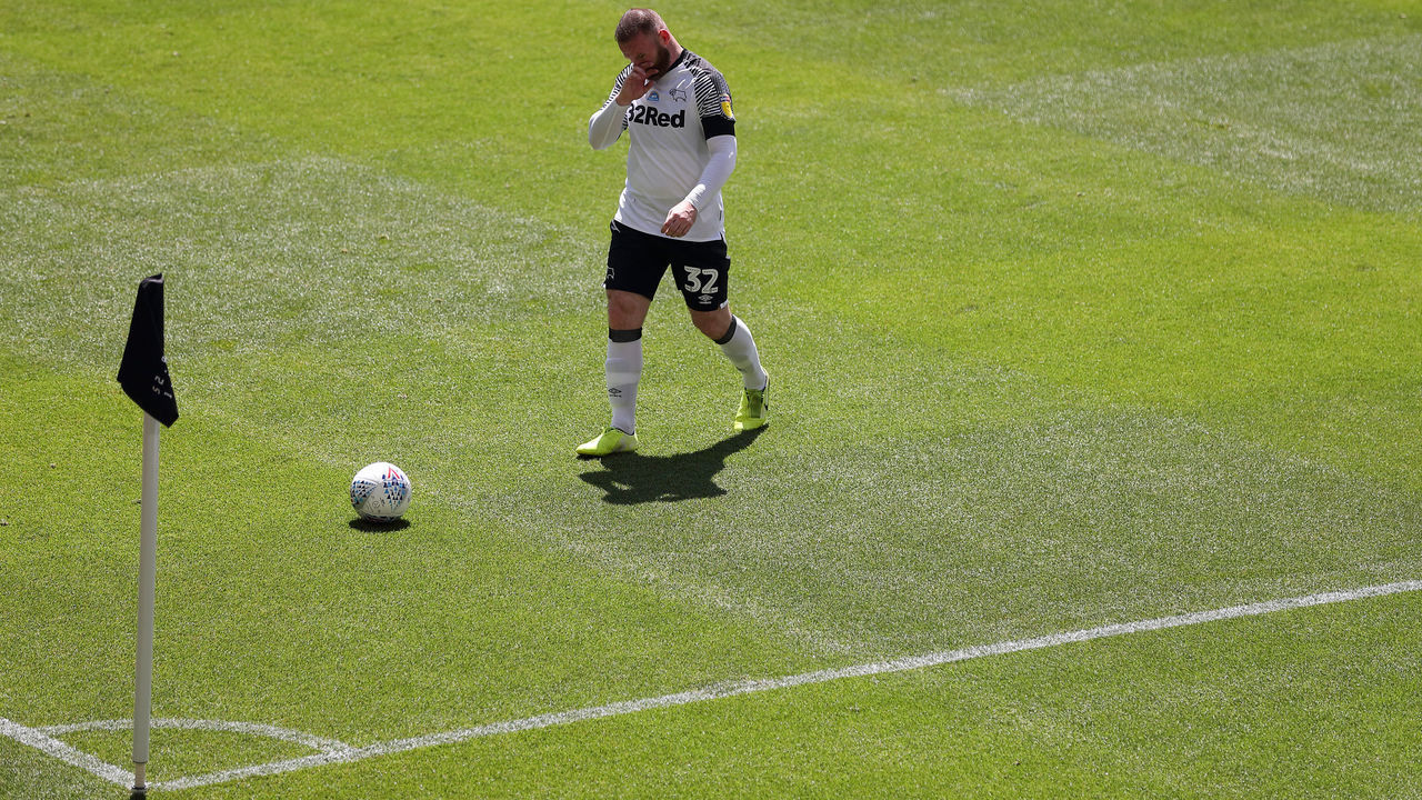 DERBY, ENGLAND - JUNE 27: Wayne Rooney of Derby County preparing to take a corner during the Sky Bet Championship match between Derby County and Reading at Pride Park Stadium on June 27, 2020 in Derby, England.