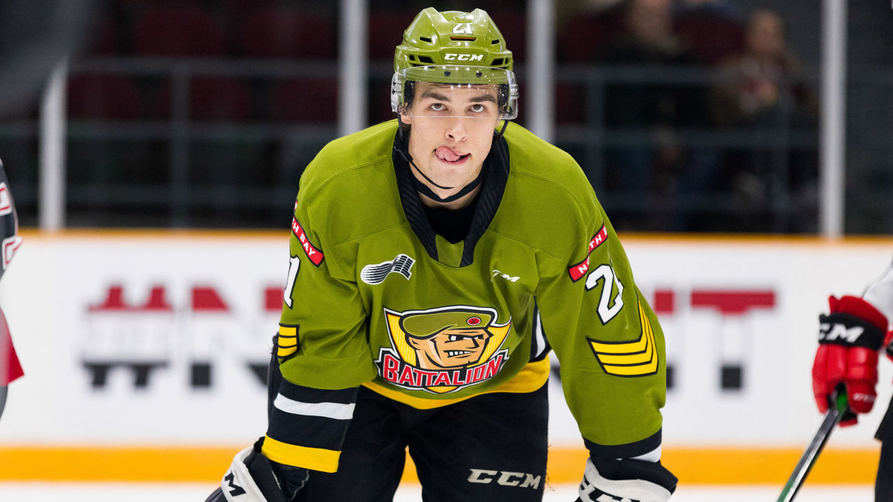 OTTAWA, ON - DECEMBER 01: North Bay Battalion Right Wing Brandon Coe (21) waits for a face-off during Ontario Hockey League action between the North Bay Battalion and Ottawa 67's on December 1, 2019, at TD Place Arena in Ottawa, ON, Canada.