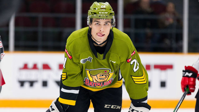 OTTAWA, ON - DECEMBER 01: North Bay Battalion Right Wing Brandon Coe (21) waits for a face-off during Ontario Hockey League action between the North Bay Battalion and Ottawa 67's on December 1, 2019, at TD Place Arena in Ottawa, ON, Canada.