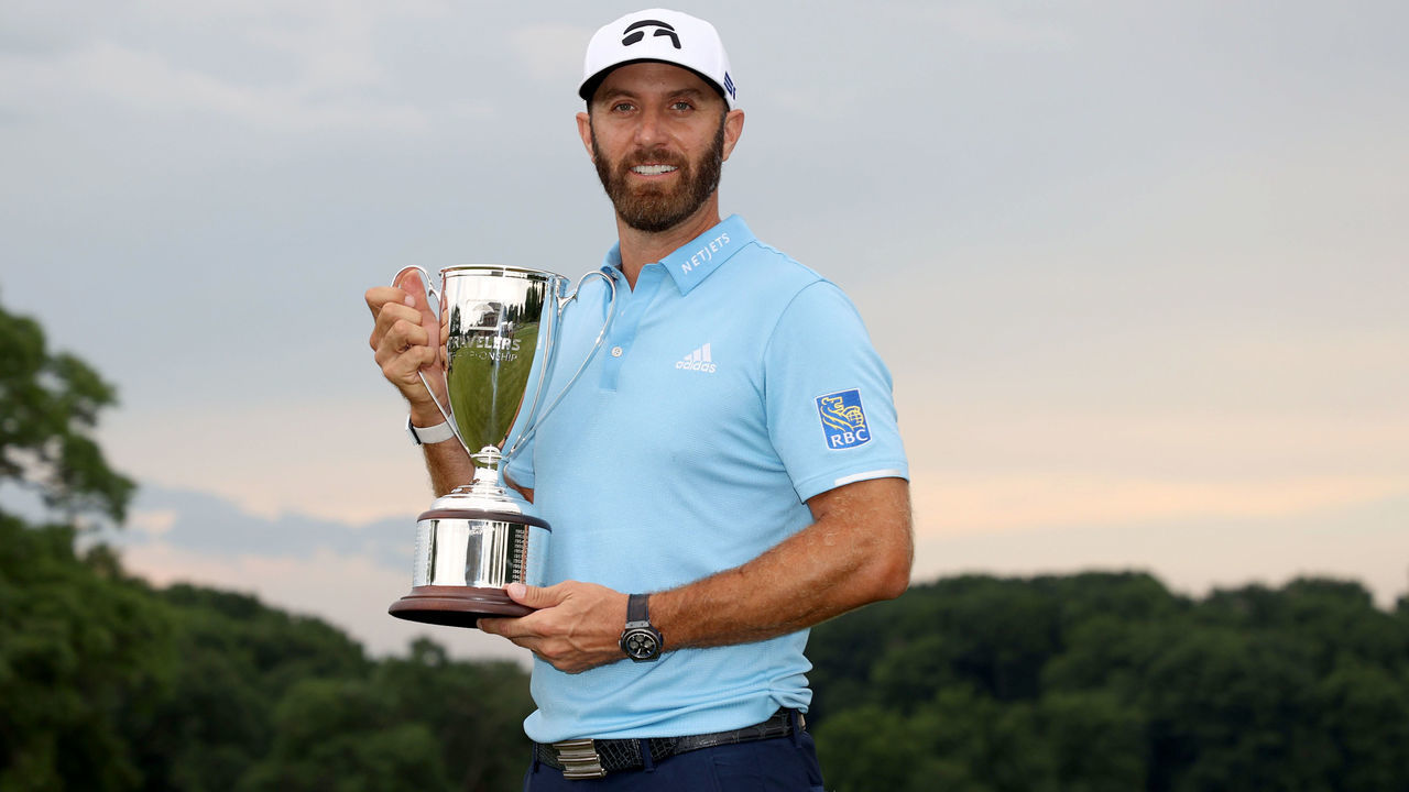 CROMWELL, CONNECTICUT - JUNE 28: Dustin Johnson of the United States poses with the trophy after winning the Travelers Championship at TPC River Highlands on June 28, 2020 in Cromwell, Connecticut.