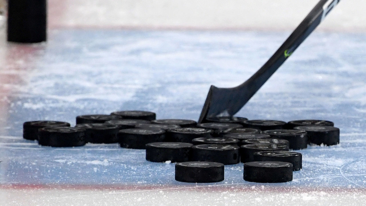 LAS VEGAS, NEVADA - FEBRUARY 20: Hockey pucks are gathered in the crease during warmups before a game between the Tampa Bay Lightning and the Vegas Golden Knights at T-Mobile Arena on February 20, 2020 in Las Vegas, Nevada. The Golden Knights defeated the Lightning 5-3.