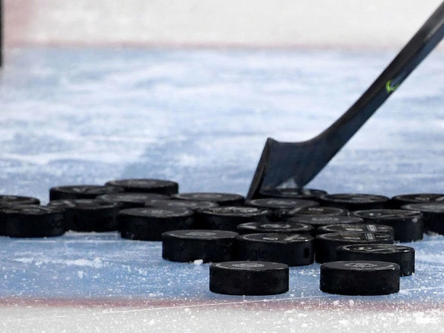 LAS VEGAS, NEVADA - FEBRUARY 20: Hockey pucks are gathered in the crease during warmups before a game between the Tampa Bay Lightning and the Vegas Golden Knights at T-Mobile Arena on February 20, 2020 in Las Vegas, Nevada. The Golden Knights defeated the Lightning 5-3.