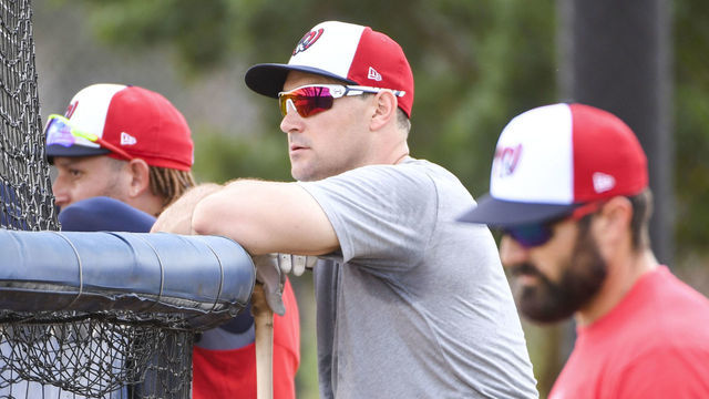WEST PALM BEACH, FL - FEBRUARY 24 Washington Nationals first baseman Ryan Zimmerman (11) watches from the screen during spring training workouts at the Stadium of the Palm Beaches.