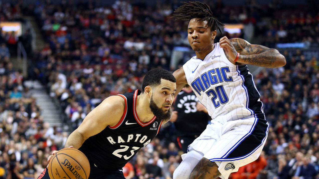 TORONTO, ON - NOVEMBER 20: Fred VanVleet #23 of the Toronto Raptors dribbles the ball as Markelle Fultz #20 of the Orlando Magic defends during the second half of an NBA game at Scotiabank Arena on November 20, 2019 in Toronto, Canada.