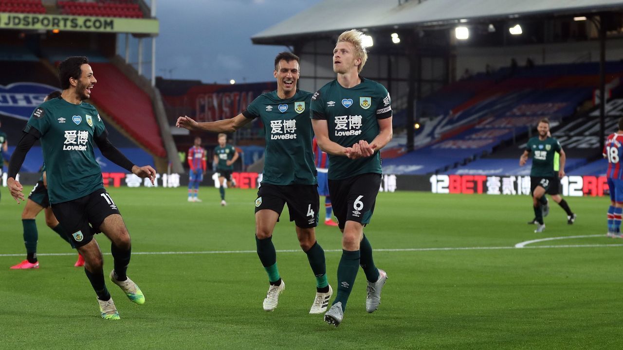Burnley's English defender Ben Mee (C) celebrates scoring the opening goal during the English Premier League football match between Crystal Palace and Burnley at Selhurst Park in south London on June 29, 2020.