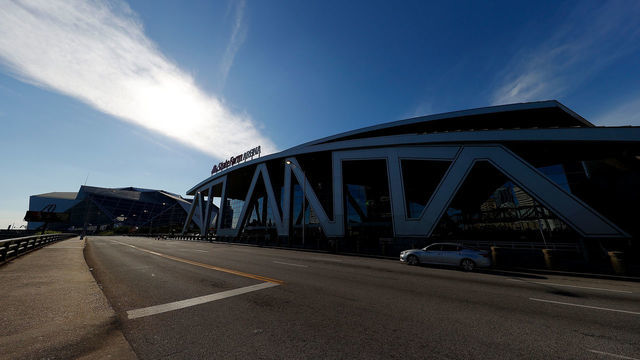 ATLANTA, GEORGIA - APRIL 04: A view of an empty Centennial Olympic Park Drive NW out front of State Farm Arena on April 4, 2020 in Atlanta, Georgia. Georgia Gov. Brian Kemp issued a statewide shelter-in-place order for all residents that went into effect at 6 p.m. on April 3, 2020, to help slow the spread of the coronavirus (COVID-19) outbreak.