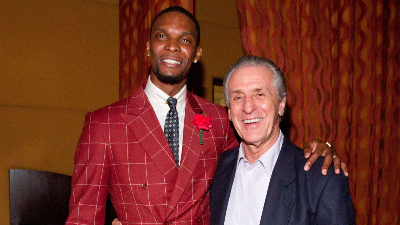 MIAMI, FL - MARCH 28: (EXCLUSIVE COVERAGE) Chris Bosh and Pat Riley attend Remy Martin presents Chris Bosh Comedy Club & Boardwalk Casino at Prelude at Barton G on March 28, 2012 in Miami, Florida.